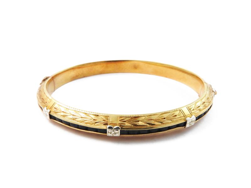 Bracciale Rigido in Oro Bianco e Giallo con Gemme Blu