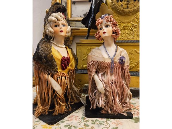 Two half biscuit dolls