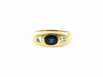 Anello a Fascia in Oro Giallo con Diamanti e Zaffiro