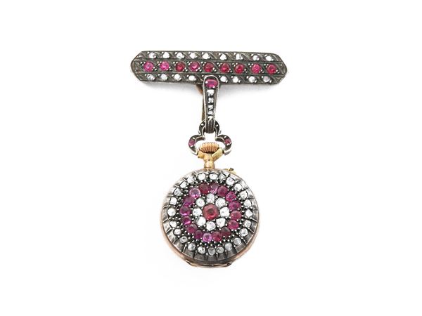 Low title gold and silver brooch watch with diamonds, synthetic rubies