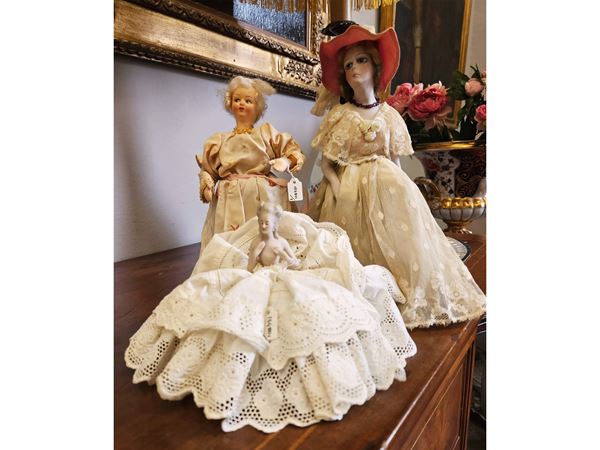 Three half dolls