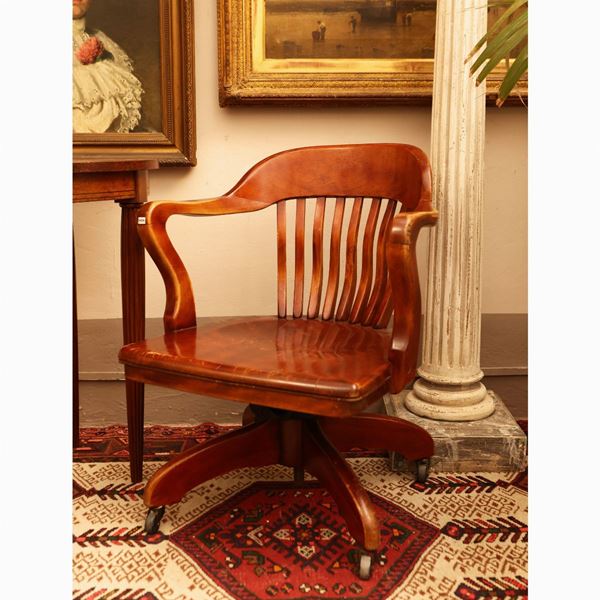 Swivel desk chair in mahogany