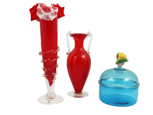 Two small red blown glass vases