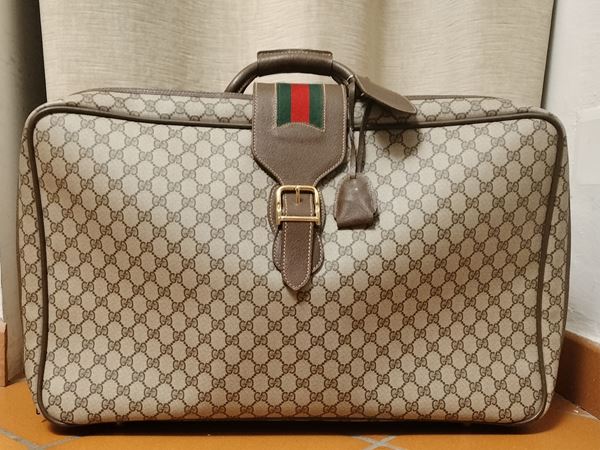 Gucci, soft suitcase in waterproofed GG monogram canvas