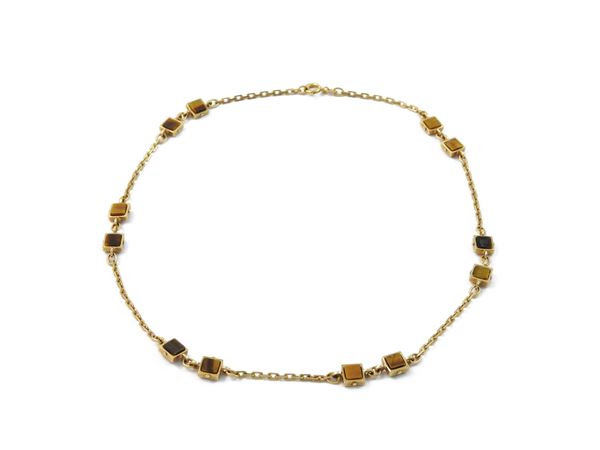 Yellow gold and tiger's eye quartz necklace