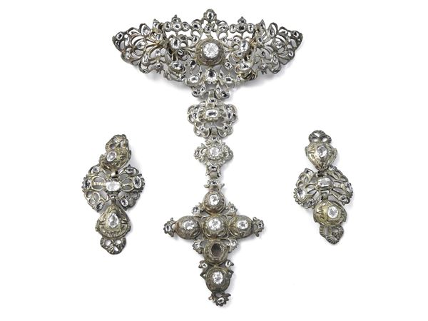 Silver alloy demi parure devant de corsage and earringswith colorless glass paste