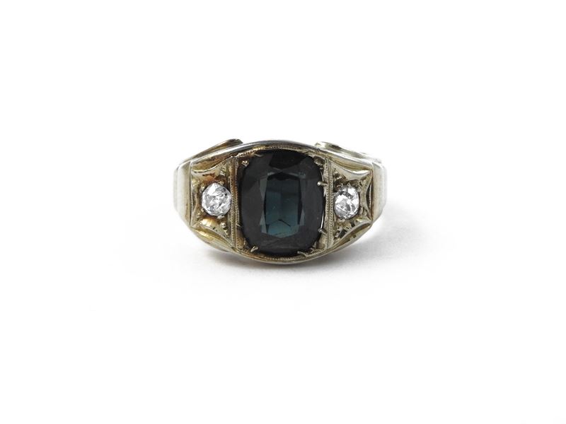 Anello in Oro Bianco con Diamanti e Zaffiro