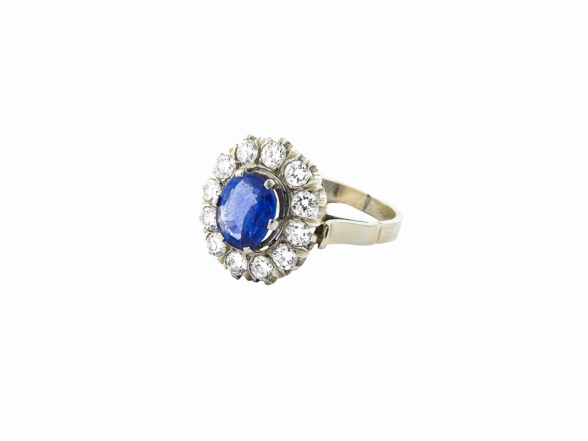 Anello in Oro Bianco con Diamanti e Zaffiro