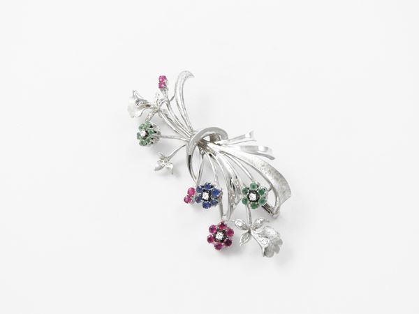 White gold brooch with diamonds, rubies, sapphires and emeralds