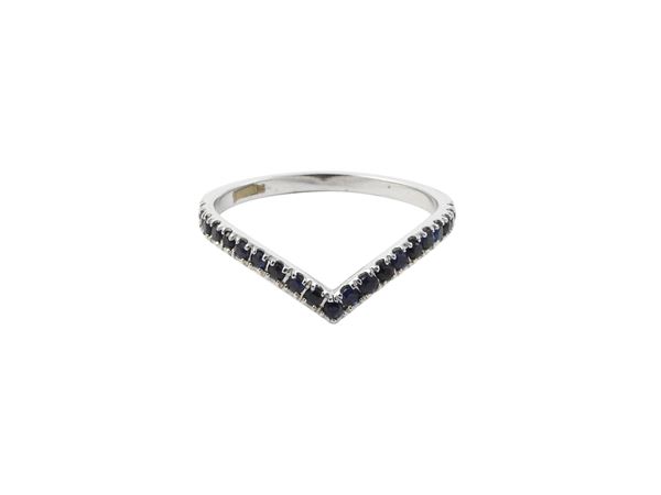 White gold ring with sapphires