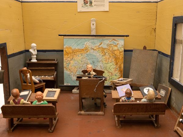 Wooden school classroom with characters and objects