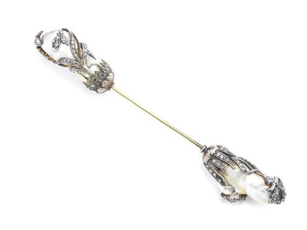 Yellow gold and silver brooch  with diamonds and probably natural baroque pearls