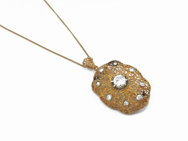 Chain with brooch pendant in yellow gold with diamonds