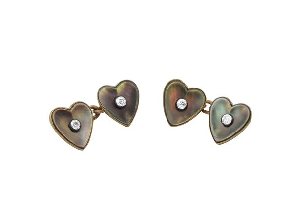 Yellow gold cufflinks with diamonds and mother of pearl