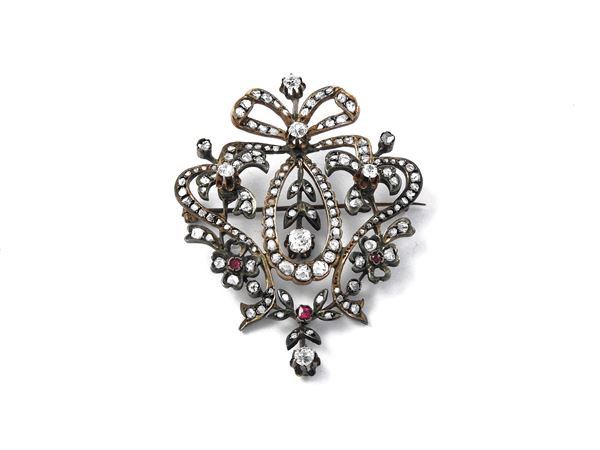 Liberty brooch pendant in low title gold and silver with diamonds and synthetic rubies