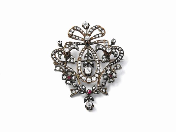 Liberty brooch pendant in low title gold and silver with diamonds and synthetic rubies