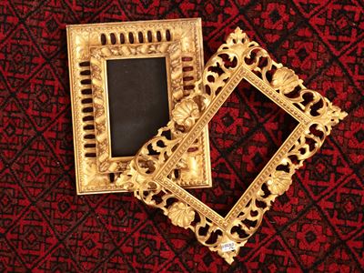 Due Cornici in Legno Intagliato e Dorato