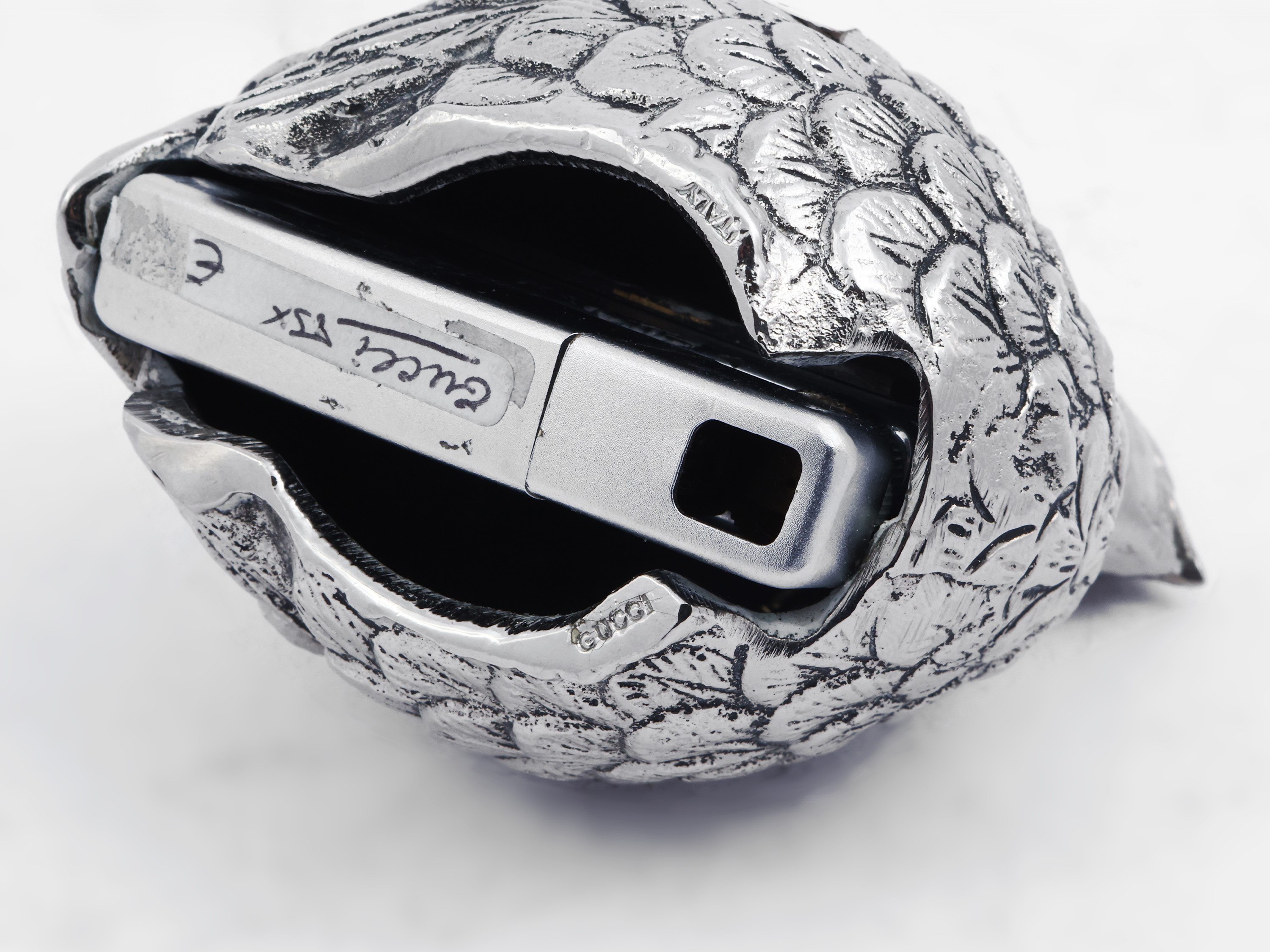 Due accendini, Brandimarte e Gucci