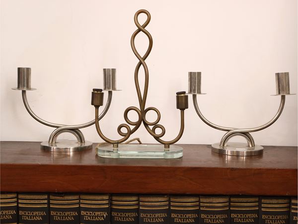 Pair of silver metal candlesticks  (first half of the 20th century)  - Auction A florentine house. Between tradition and modernity Collection, paintings and furnishing - III - - Maison Bibelot - Casa d'Aste Firenze - Milano