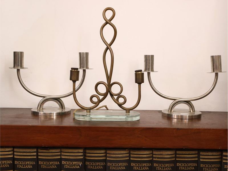 Coppia di Candelabri in Metallo Argentato