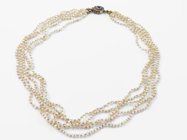 Five strand pearl necklace with yellow gold and silver clasp with diamonds and sapphire