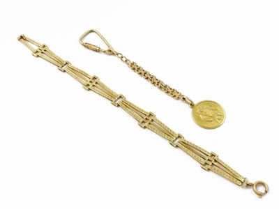 Un Bracciale e un Portachiavi in Oro Giallo