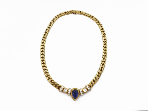 Yellow gold chocker with diamonds and sapphire