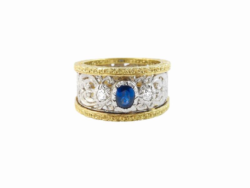 Anello a Fascia in Oro Bianco e Giallo con Diamanti e Zaffiro