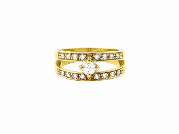 Yellow gold ring with diamonds