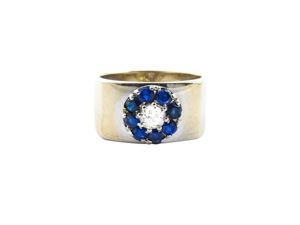 White gold band ring with diamond and sapphires