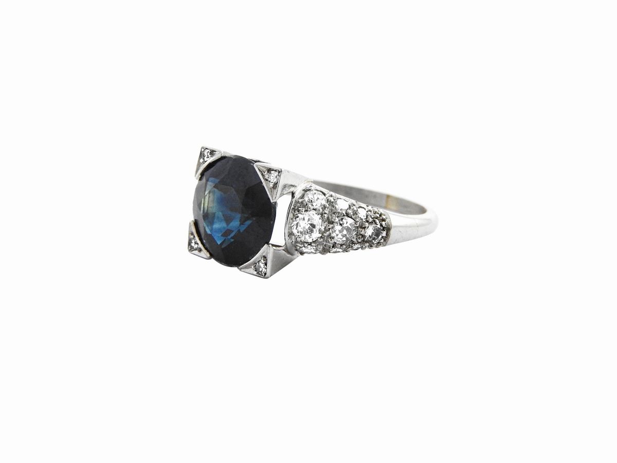 Anello in Platino con Diamanti e Zaffiro