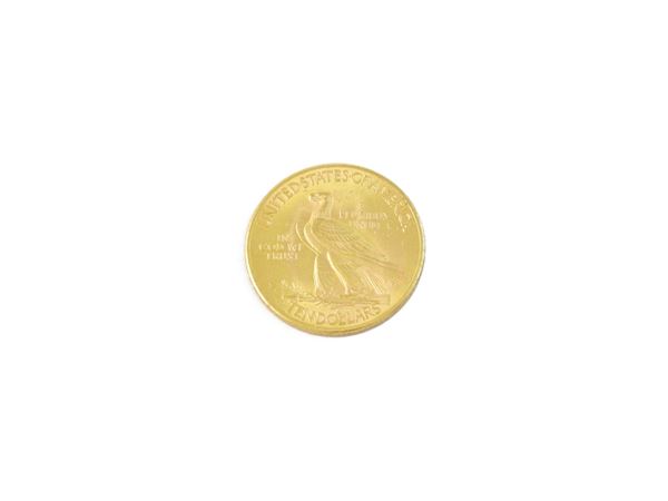 Una moneta da 10 Dollari Indiani in oro