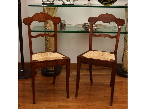 Series of three walnut chairs