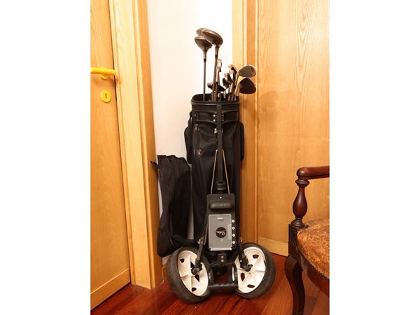 Bag containing golf clubs