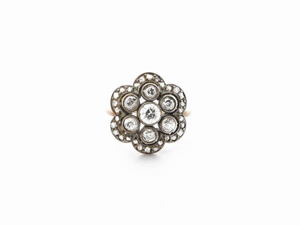 Yellow gold and silver ring with diamonds