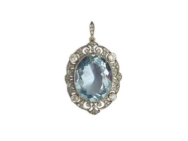 Gold and platinum pendant with diamonds and aquamarine