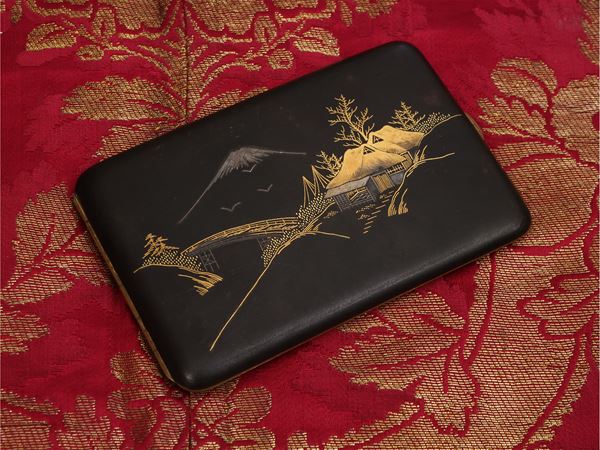 Cigarette case in silver and golden metal