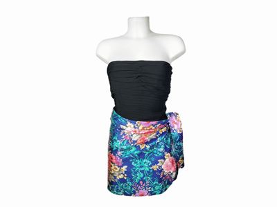 Una Maglia, un Top a Corpino ed una Gonna