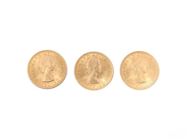 Tre monete da una sterlina in oro