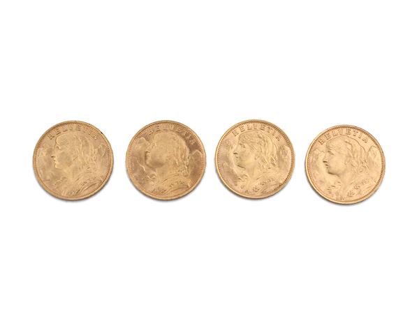 Four 20 Swiss franc gold coins