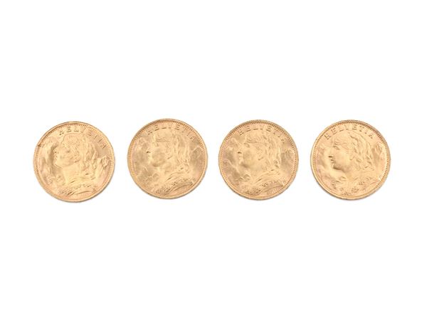 Four 20 Swiss franc coins