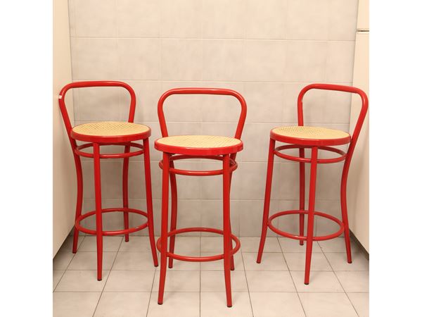 Five red kitchen stools
