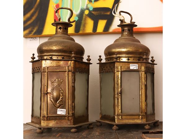 Pair of golden metal lanterns