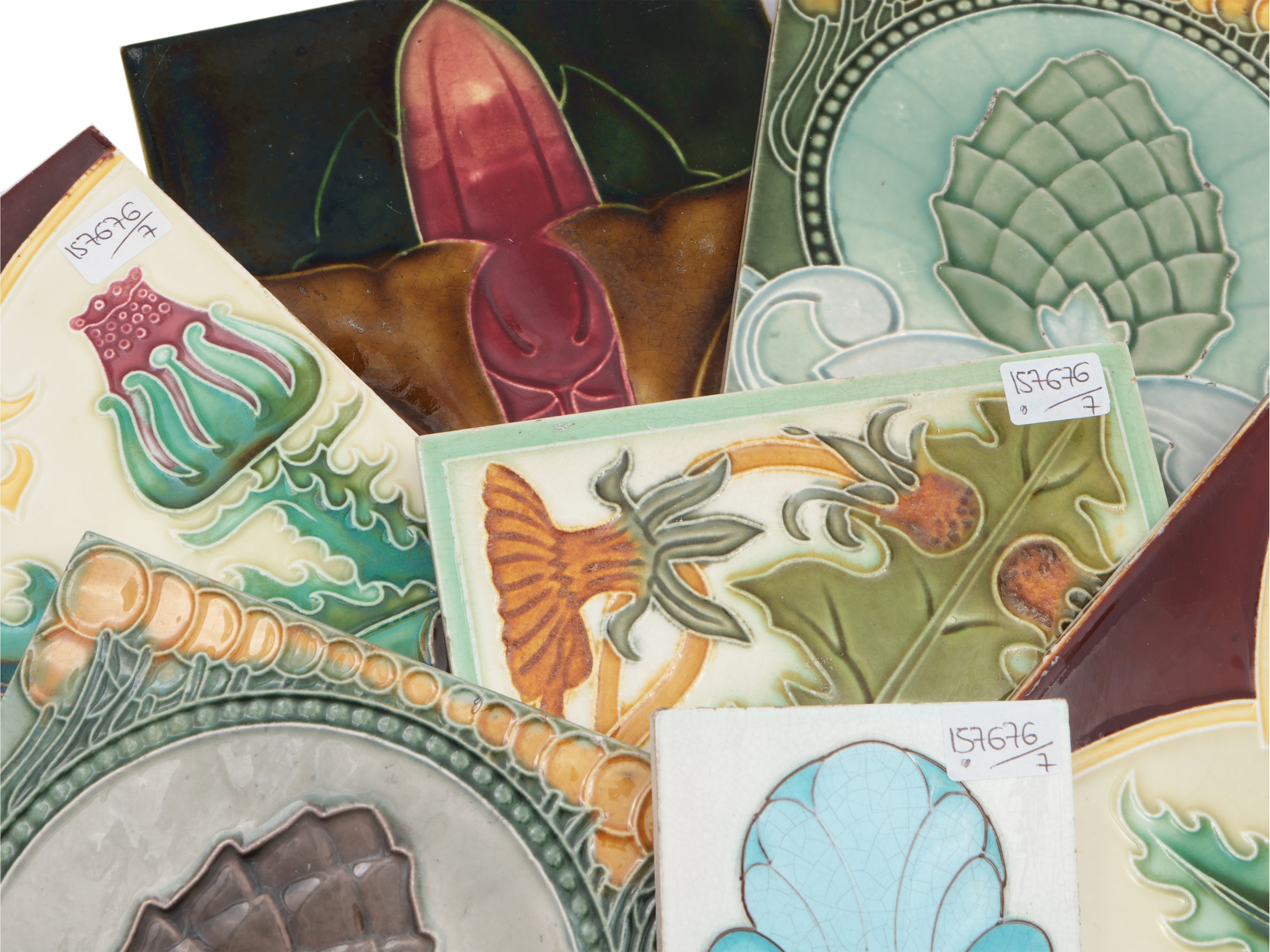 Serie di Sette Piastrelle Liberty in Ceramica Smaltata