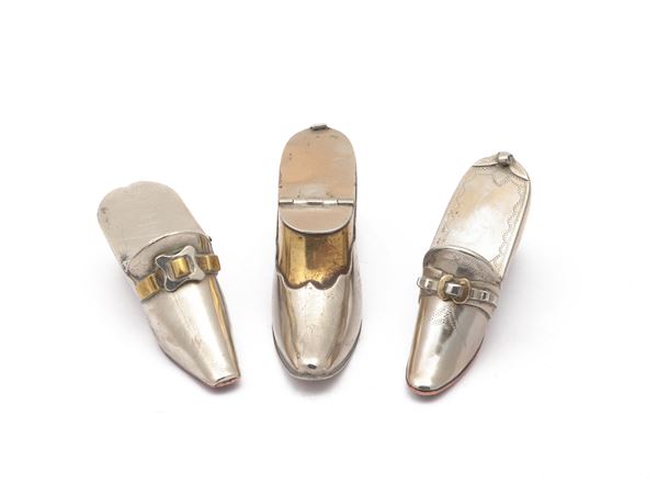 Three metal snuffboxes shaped like shoes, early 20th century