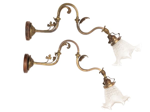 Pair of brass and glass wall lights