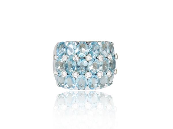 White gold band ring with diamonds and aquamarines