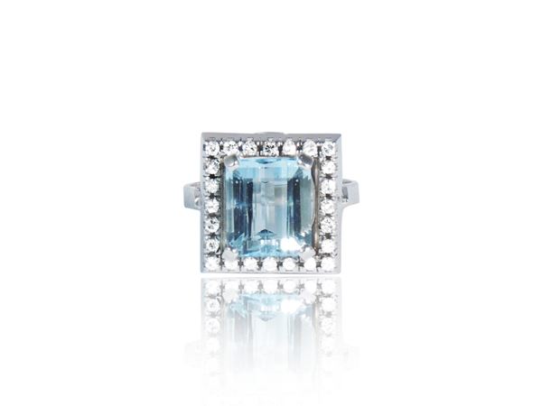 White gold ring with diamonds and aquamarine