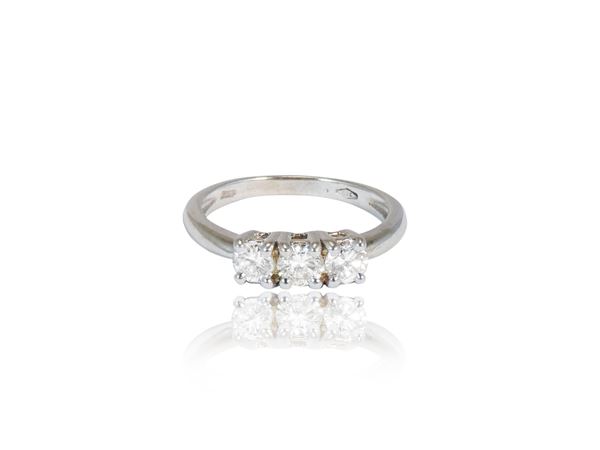 Trilogy ring in white gold with diamonds