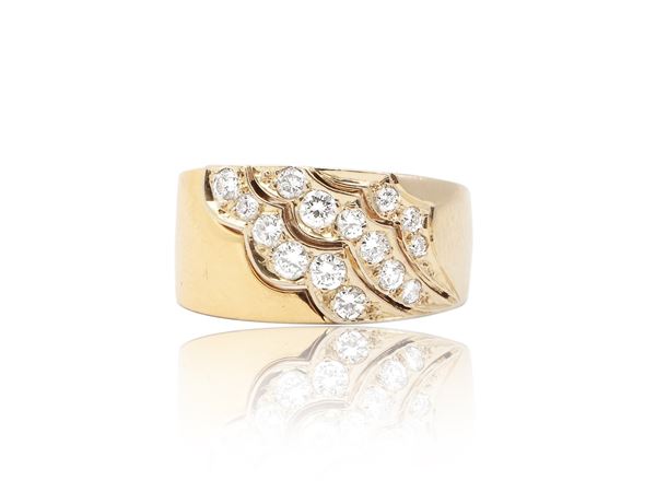 Band ring in yellow gold and white gold with diamonds